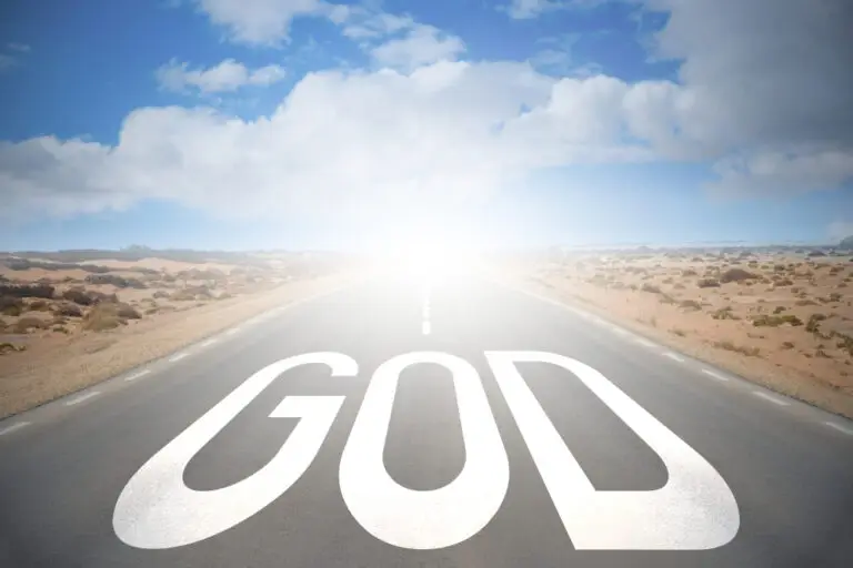 picture of road through desolate place with name God in foreground and bright destination in back