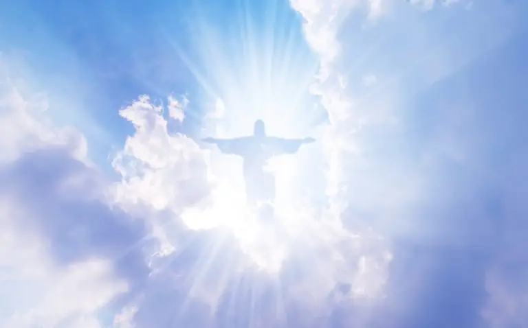 Jesus outline against clouds